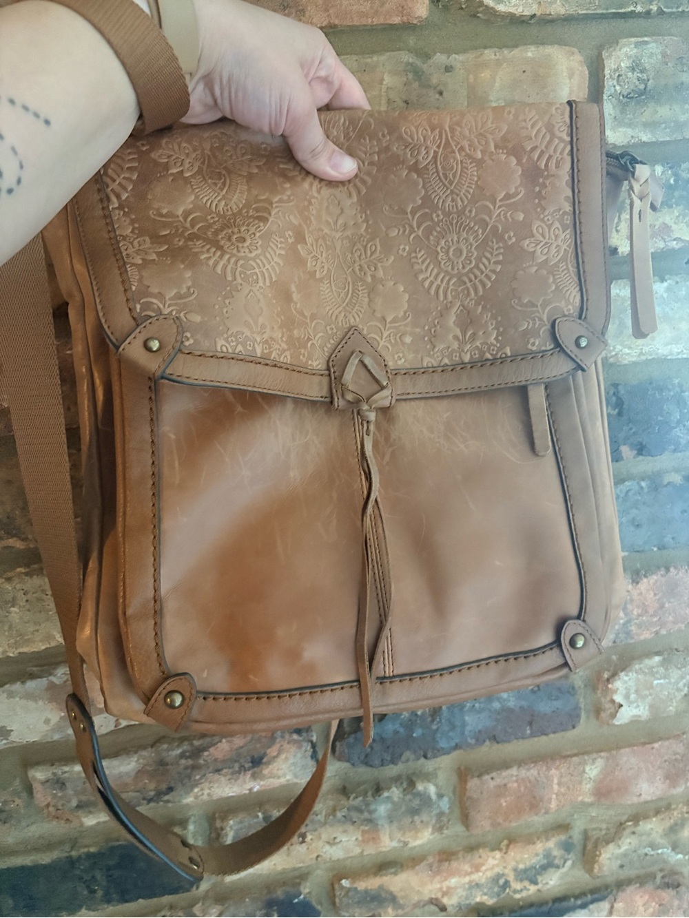The Sak Tan Embossed Leather Backpack with Tassel Detail